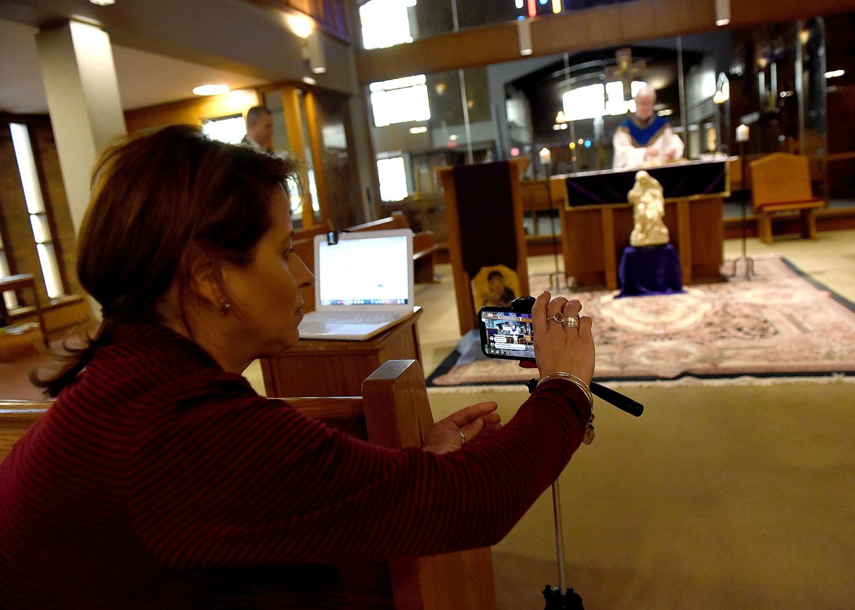 Parish secretary Kerri Stanley live streams Mass
